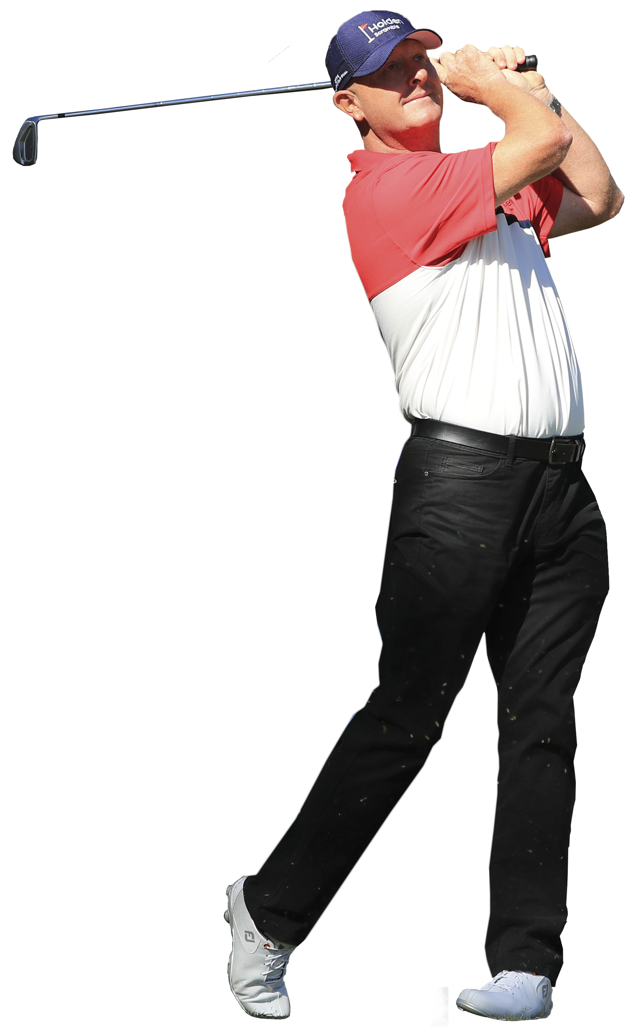 Person in a golf swing wearing a red and white shirt, black pants, and a blue cap.
